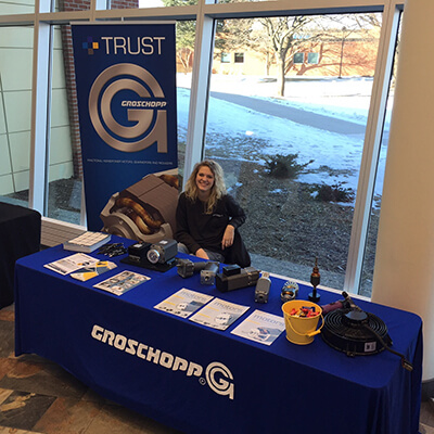 Groschopp employee sitting at our booth at the "Your Future at Work" event.