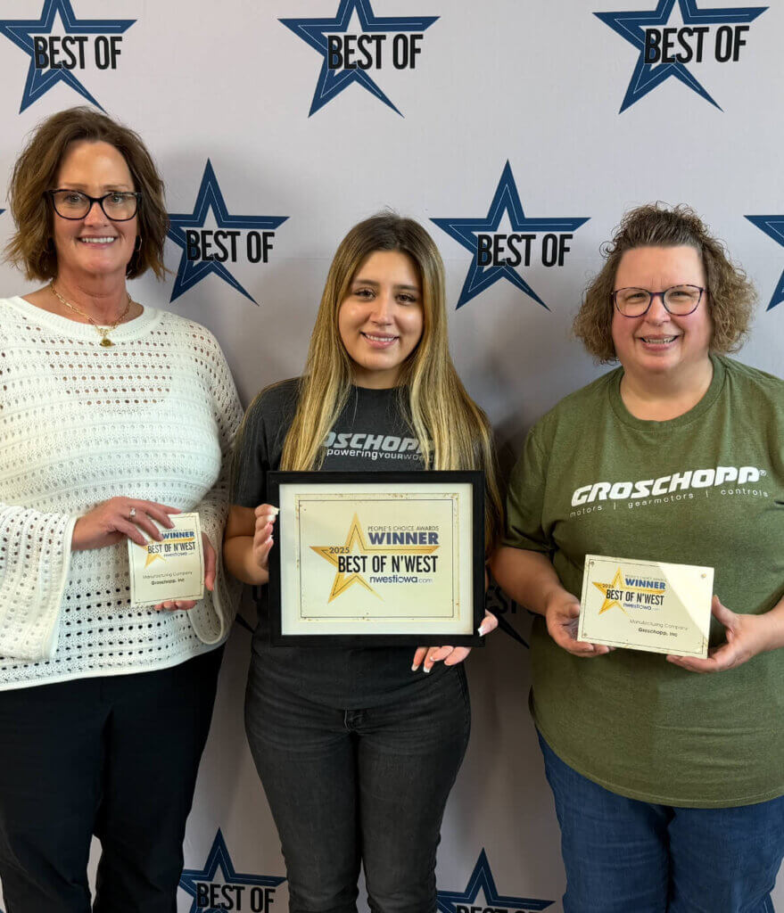 Groschopp team holding Best Manufacturing Company award plaque