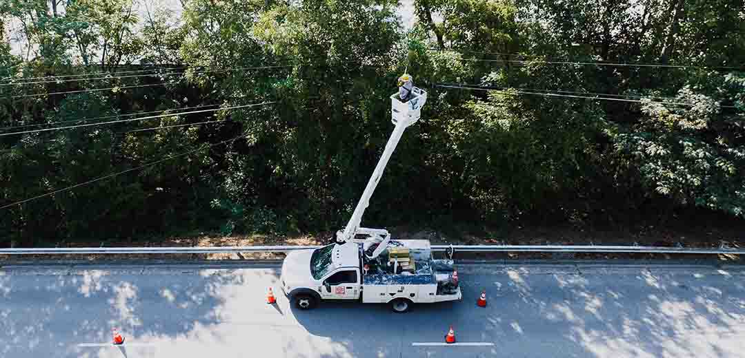 Person operating a service truck equipped with ventilated storage cabinets