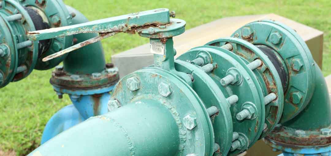 Industrial water treatment system with pumps and piping for motor application